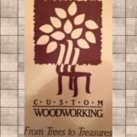 Custom Woodworking & Interiors Logo