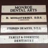 Monroe Dental Arts Logo