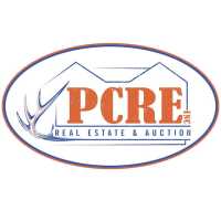 PCRE Real Estate & Auction Inc Logo