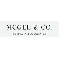 Janna McGee, McGee & Co. Real Estate Associates Logo