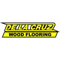 De La Cruz Wood Flooring Logo