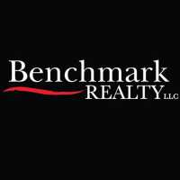Natasha Holcomb - Benchmark Realty Logo