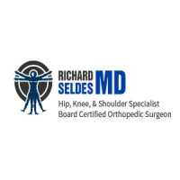 Dr. Richard M. Seldes Logo