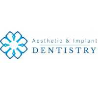 Aesthetic & Implant Dentistry Logo