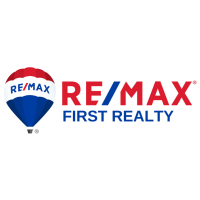 Randi L. Dickman - RE/MAX First Realty Logo