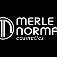 Merle Norman Cosmetics & Edie's Salon Logo