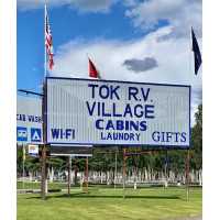Tok RV Village Campground & Cabins Logo