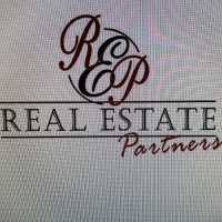 Steve Houck Broker/Owner, Real Estate Partners Logo