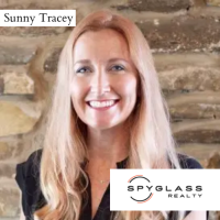Sunny Tracey Realtor - Spyglass Realty Logo