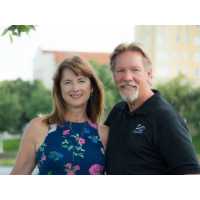 Jim and Tammie Hampton at S&D Real Estate Services Logo